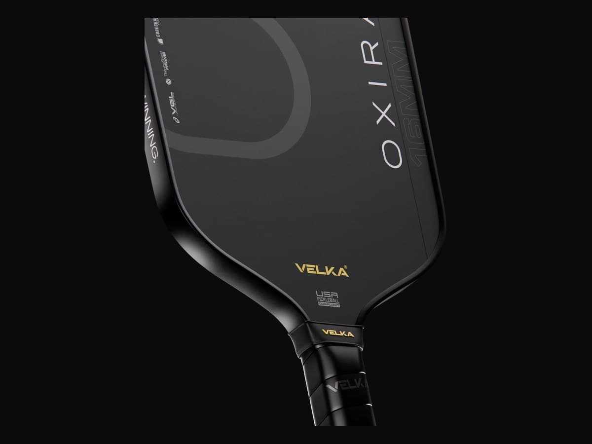 A close view of the Velka Oxira showing the edge guard and the carbon frame around the face